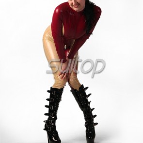 Sexy women's latex catsuit rubber tedding in red and trasparent trim with back zip